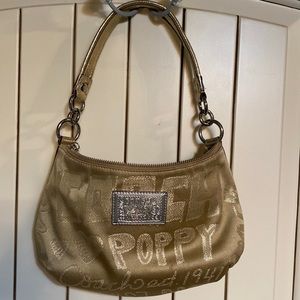 Coach hold metallic / khaki good condition